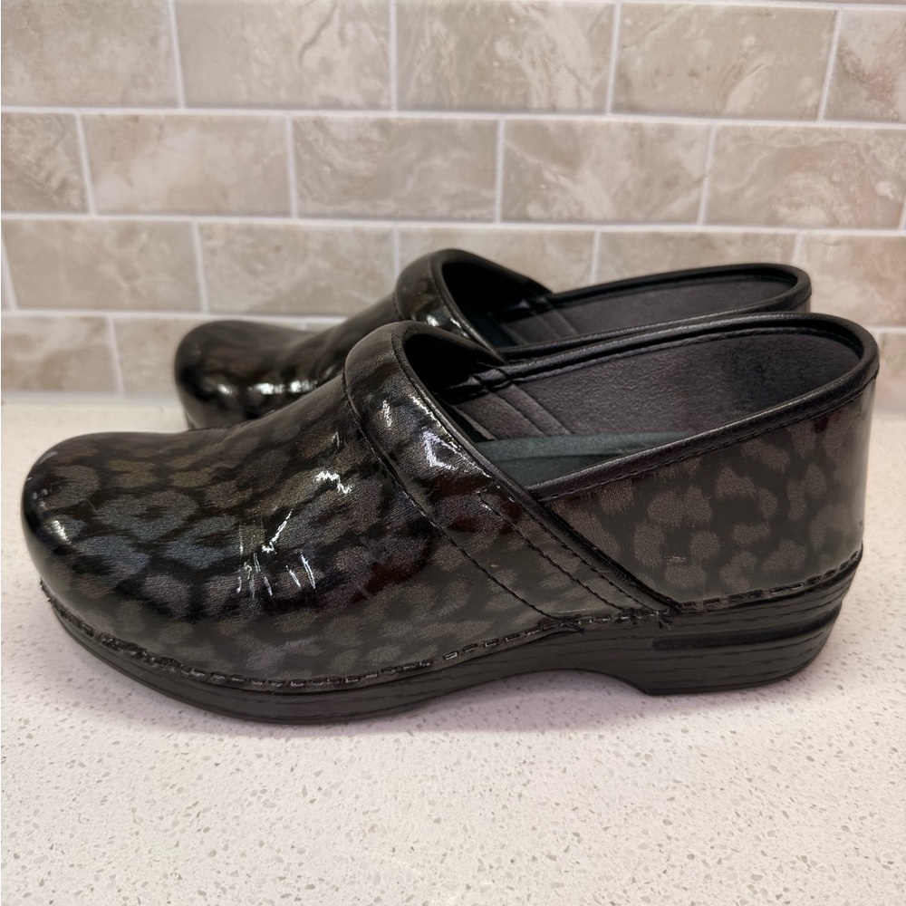 Dansko Black Leopard Print Clogs - image 5